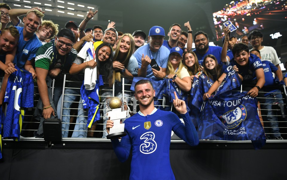 Mount poses with his man of the match trophy after the 2-1 victory