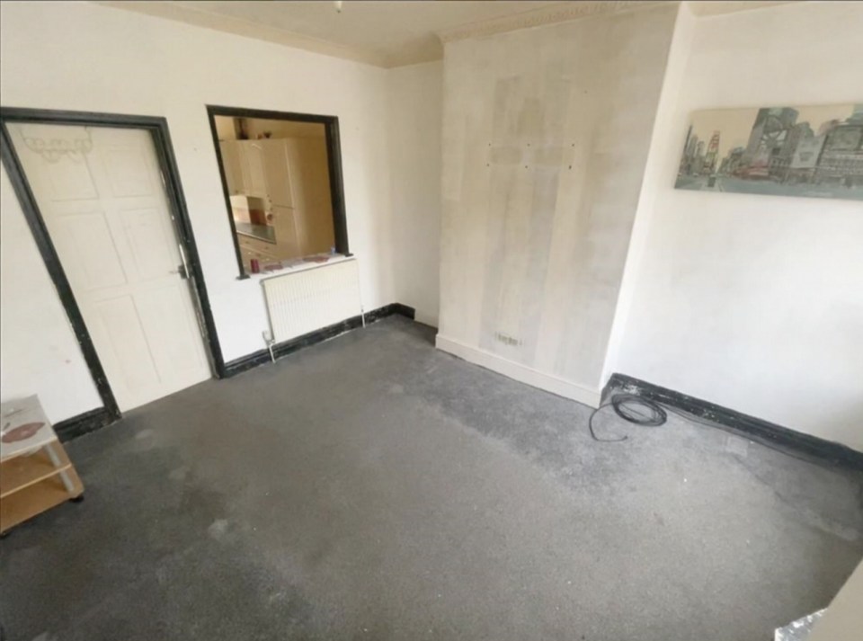 A spacious and light-filled lounge located on the ground floor leads through to a contemporary kitchen