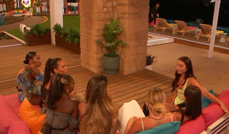 Coco talking to the girls about what she and Andrew got up to in Casa Amor