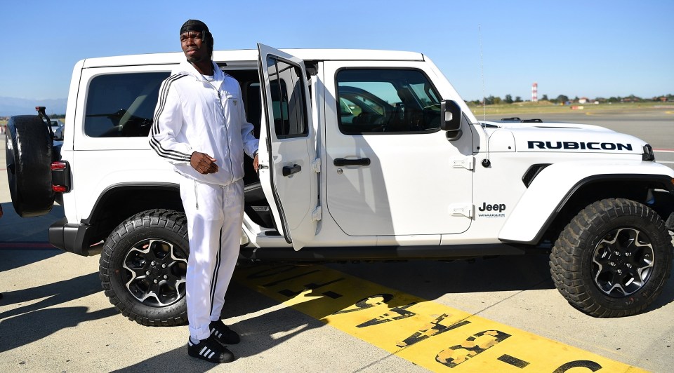 Paul Pogba's arrival was jeep and cheerful before he got an excited earful from delighted Juventus followers who had queued to see him