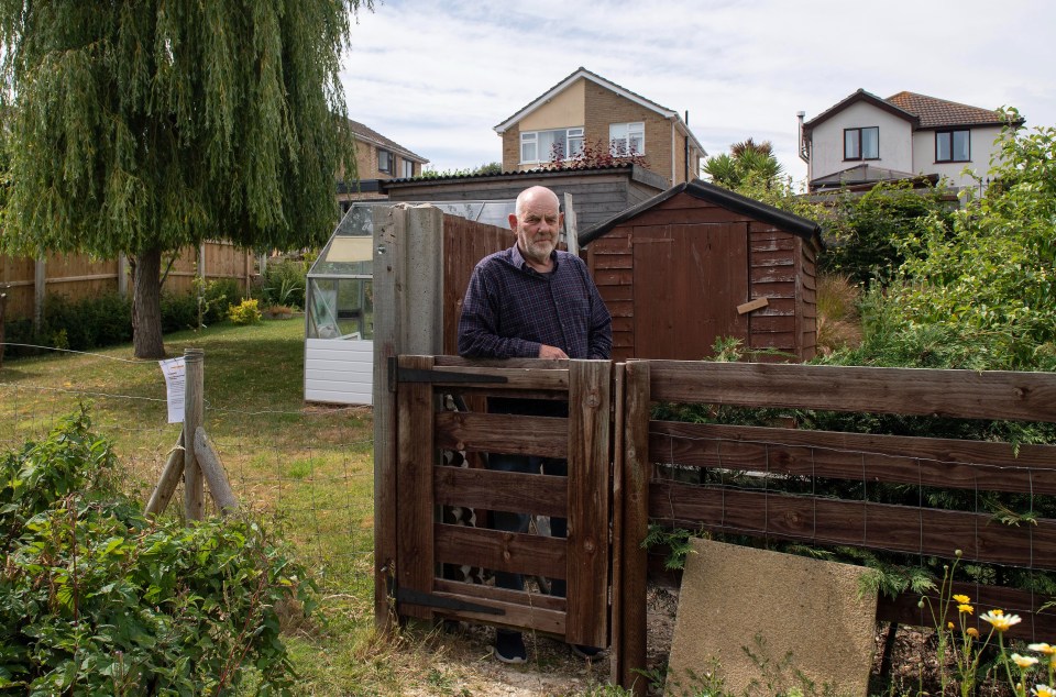 A pensioner has been left furious after his neighbour put up a 6ft-tall fence between their gardens