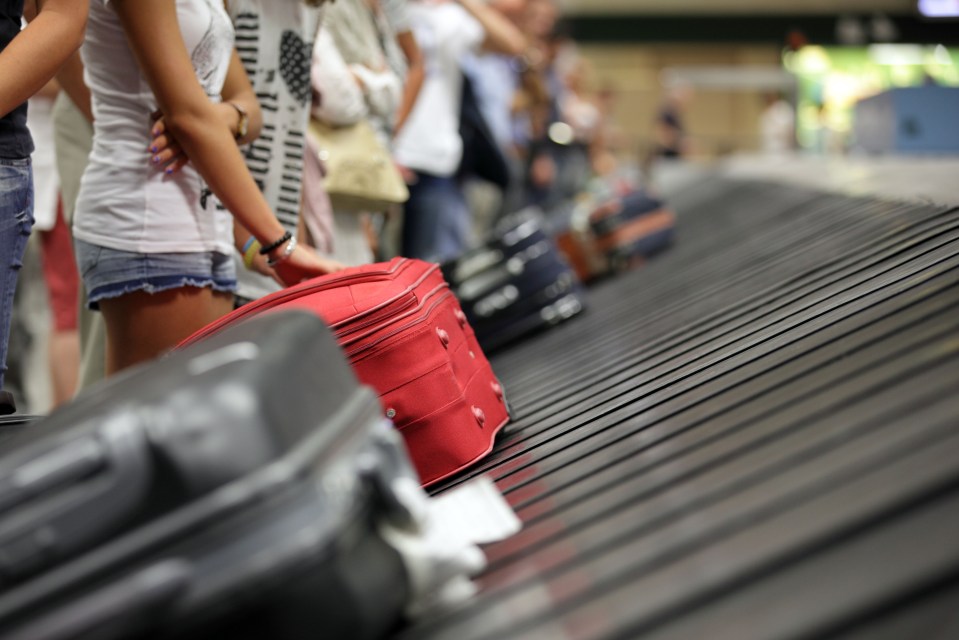 A brightly coloured suitcase will stand out amongst the black ones