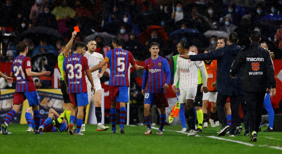 Kounde was sent off for Sevilla against Barcelona last season