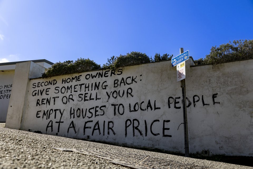 Fed-up locals have even vandalised homes in protest of tourists snapping up properties