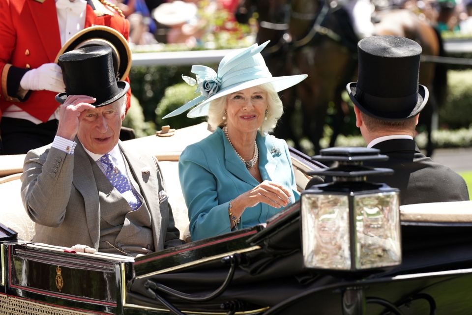 The couple arrive by carriage during the Royal Procession ahead of day one of Royal Ascot