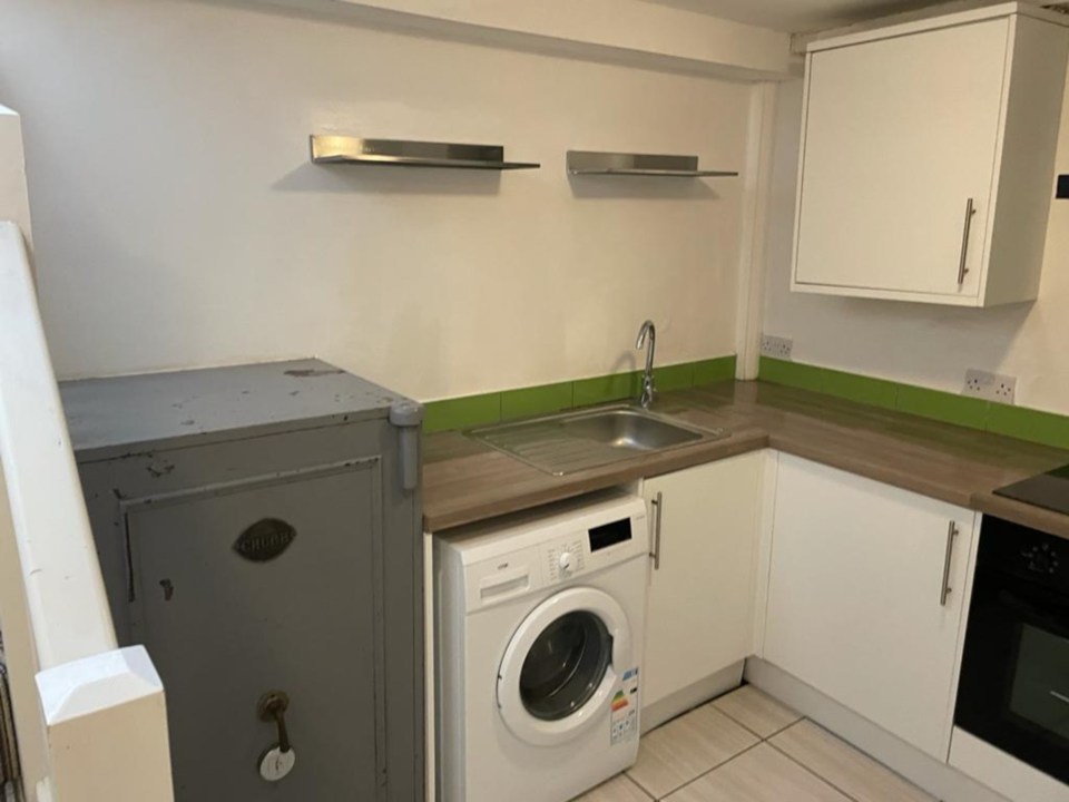 A Bristol home up for rent has a safe where the fridge should be