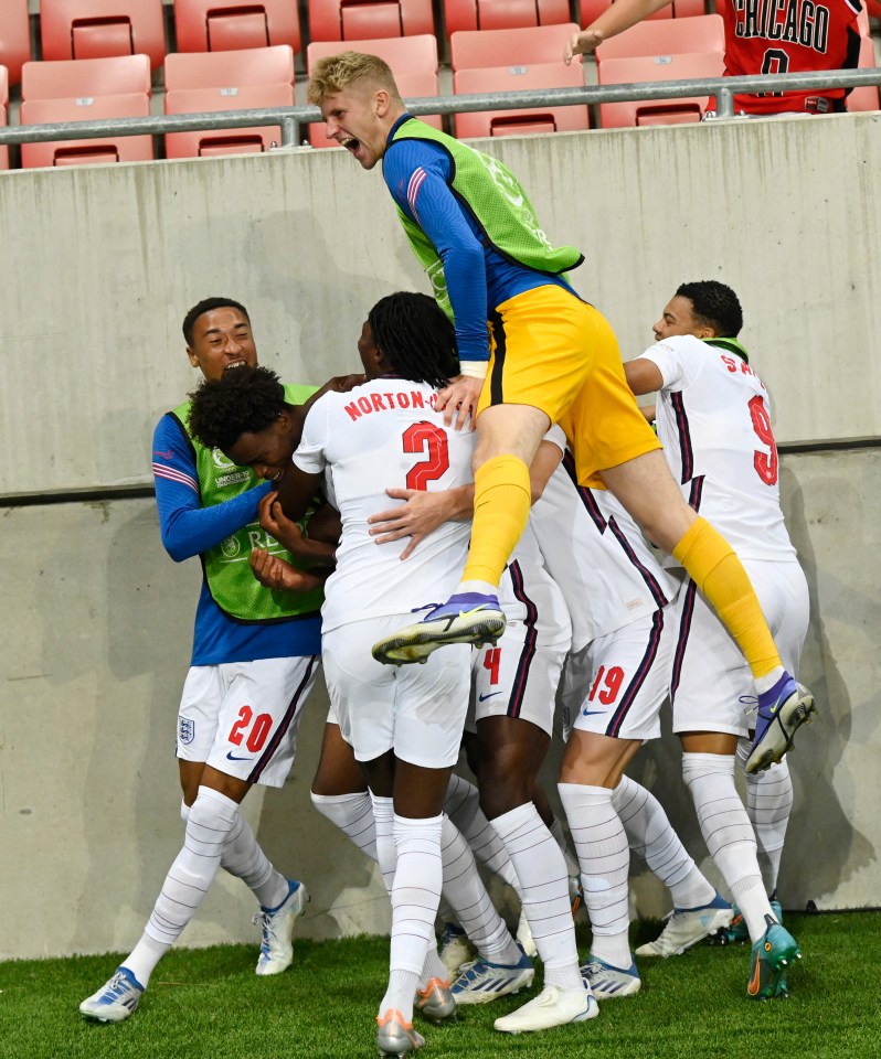 Carney Chukwuemeka is mobbed by team-mates after his goal made it 2-1