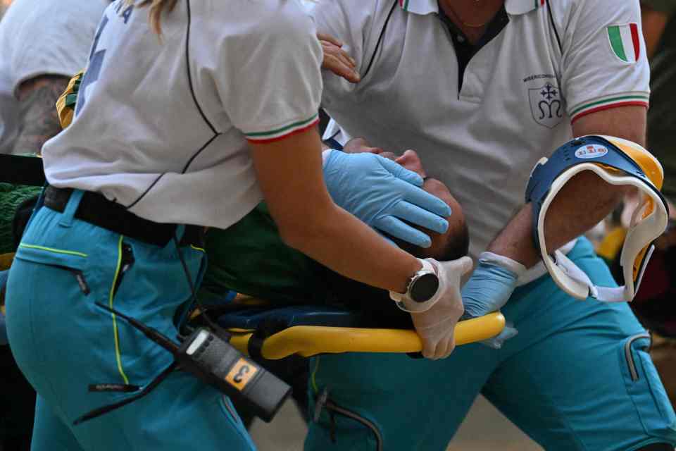 One of the jockeys is taken for treatment after an early fall