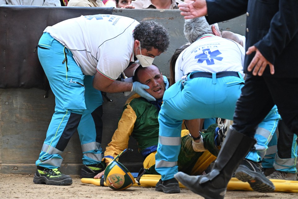 One of the jockeys needs medical help after taking a knock to the head during the race