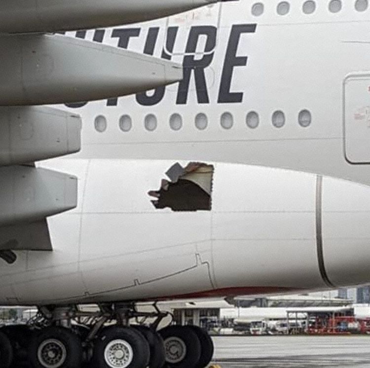 Passengers discovered a gaping hole in the side of their plane after landing in Brisbane from the 14 hour flight