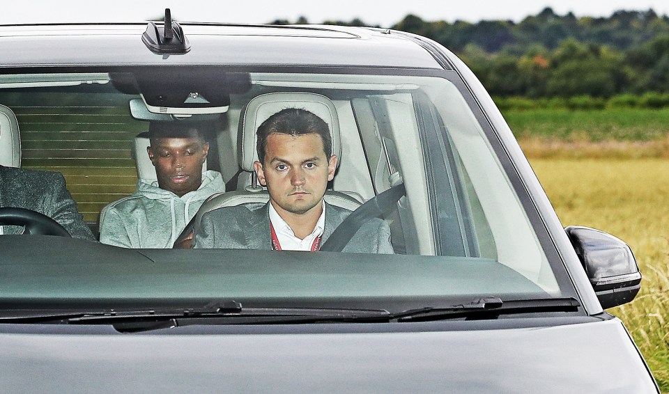 Tyrell Malacia arrives at Carrington for the first time ahead of his transfer