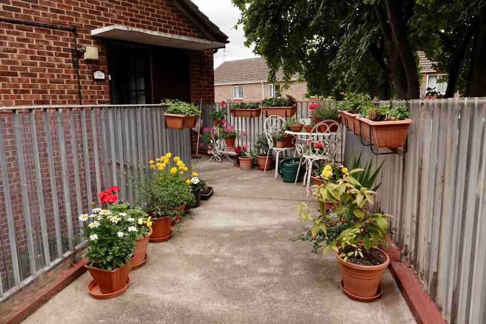 Norwich City Council claims that the flower pots on this balcony are a fire hazard and must be removed