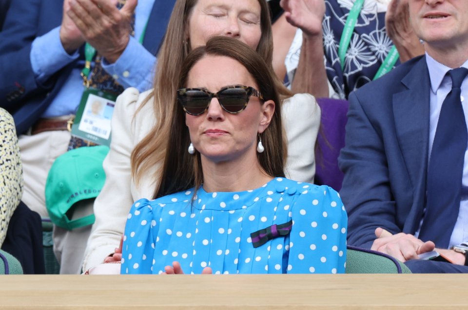 The Duchess of Cambridge watched the action unfold from behind a pair of dark sunglasses