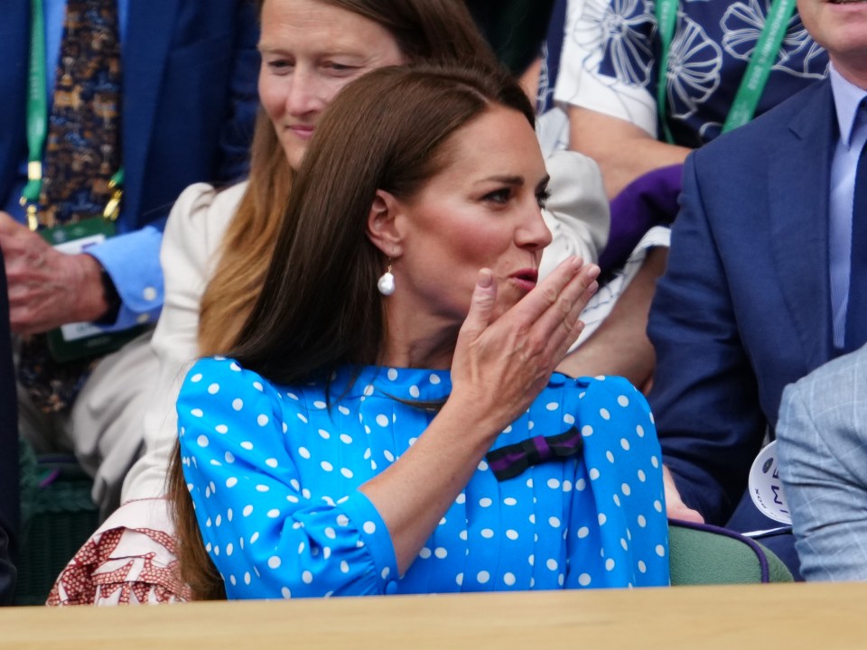 The Duchess of Cambridge blew a loving kiss to her parents Carole and Michael Middleton at Wimbledon today