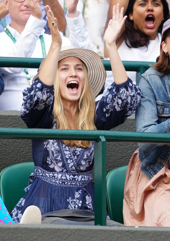 Girlfriend Louise Jacobi was cheering Cam on during his quarter-final