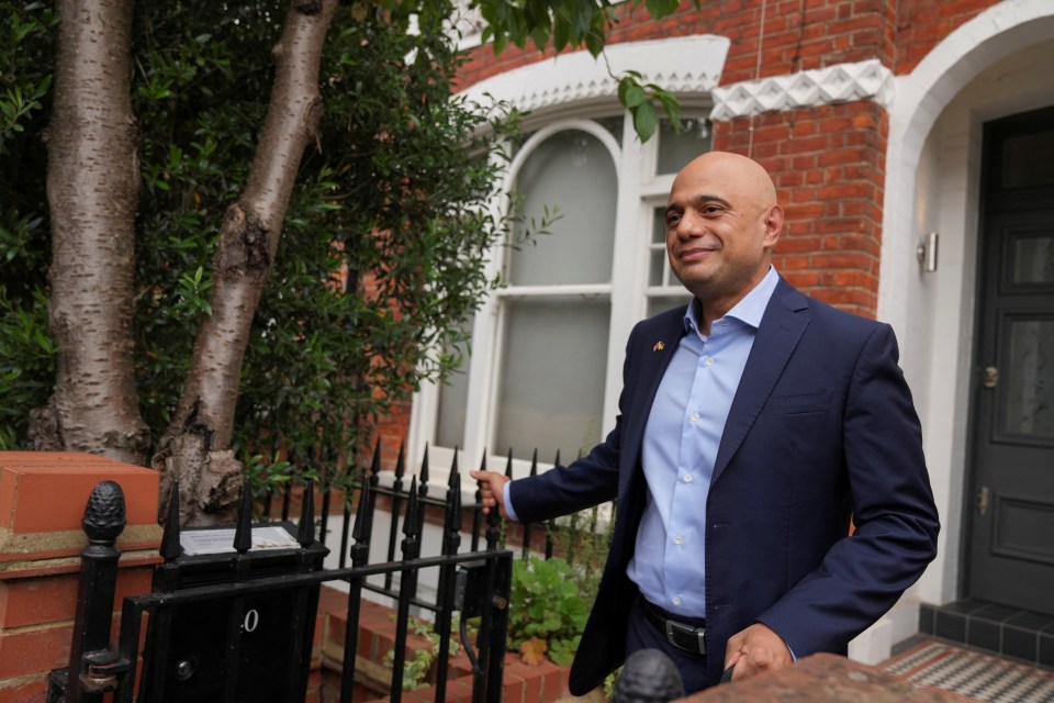 Sajid Javid leaves his home in London