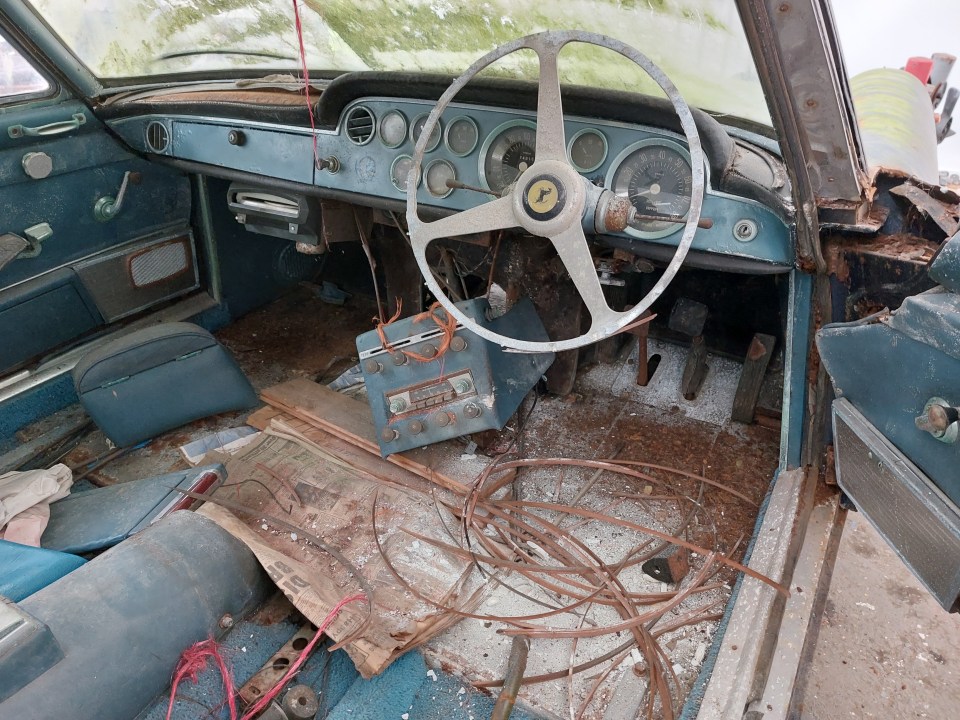 The front seats have long gone and the rest of the interior is a mess after 40 years