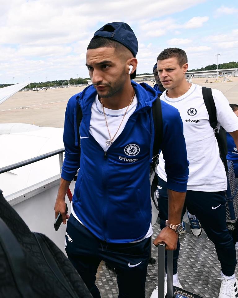 Ziyech looks glum as he boards the plane to the US