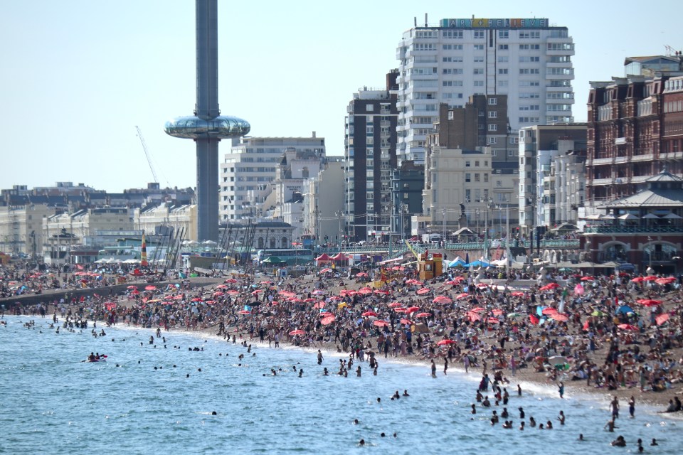 Tourists flocked to Brighton Beach on Saturday as temperatures soared