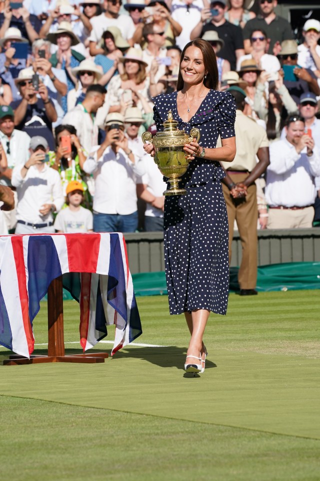 Kate, patron of the All England Club, beamed as she presented the trophy to Novak Djokovic