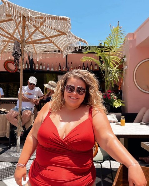 Gogglebox star Amy Tapper looked great in this plunging red swimsuit