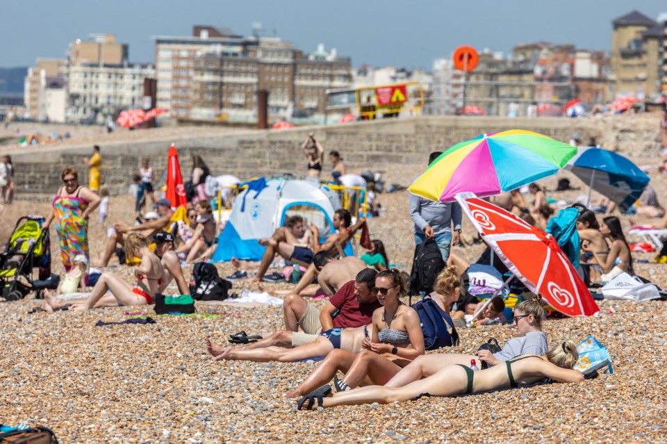 People enjoyed the hot sunshine on Brighton Beach, Sussex yesterday