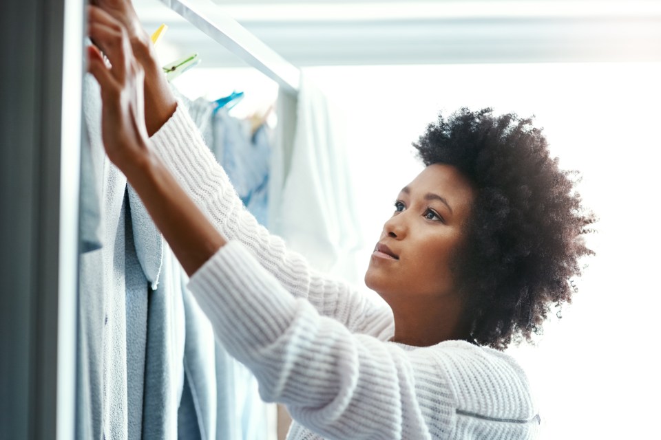 Hanging up wet towels in doorways and at open windows can help cool your home down