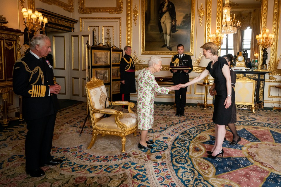 Her Majesty smiled brightly as she met her guests this afternoon