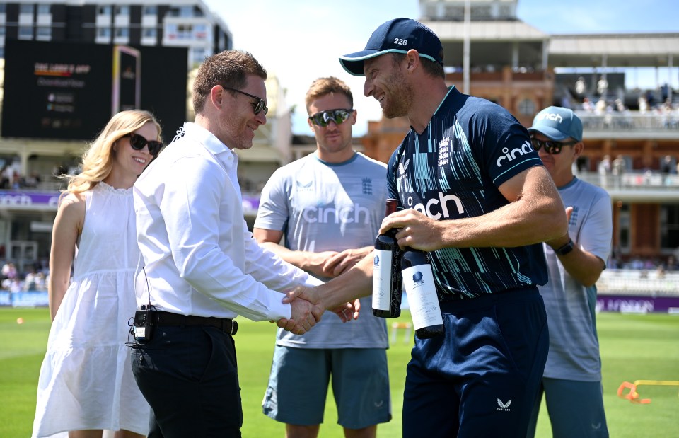 Jos Buttler presented the bottles to Eoin Morgan