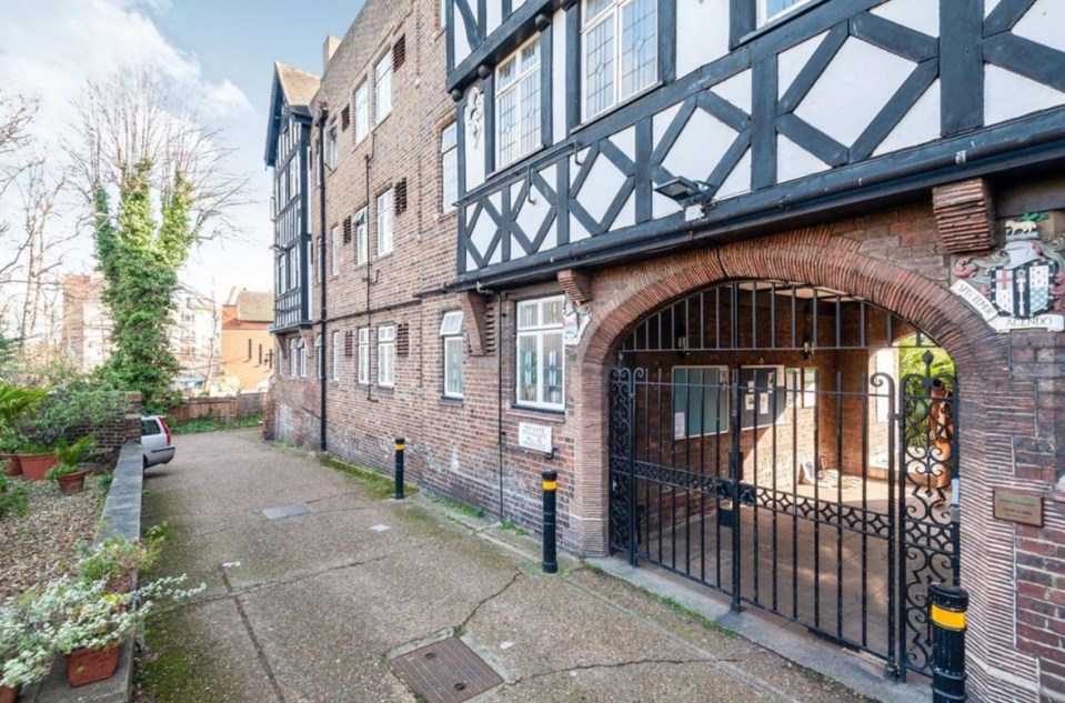 The flat is housed in a lovely Tudor-style gated development