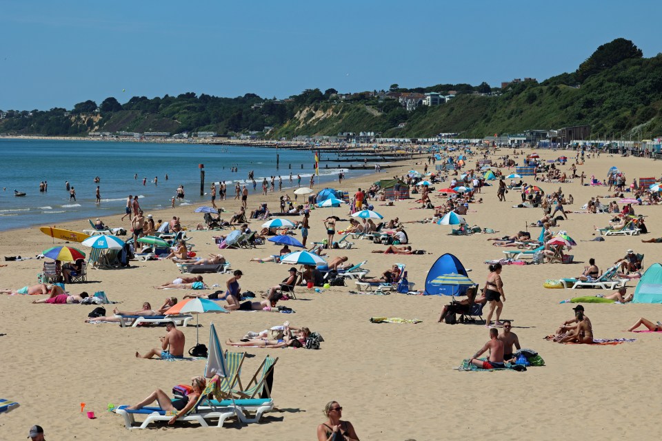 Beachgoers have flocked into the sunshine across the UK