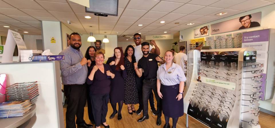 Joshua posed for pictures with shop staff after having his eyes checked over