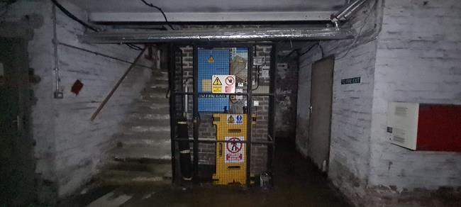 The video tour reveals a dark, damp basement