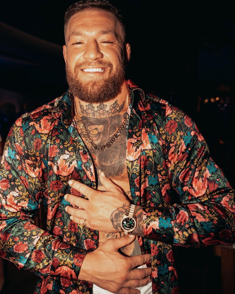 The UFC superstar dressed in a floral shirt and Rolex watch