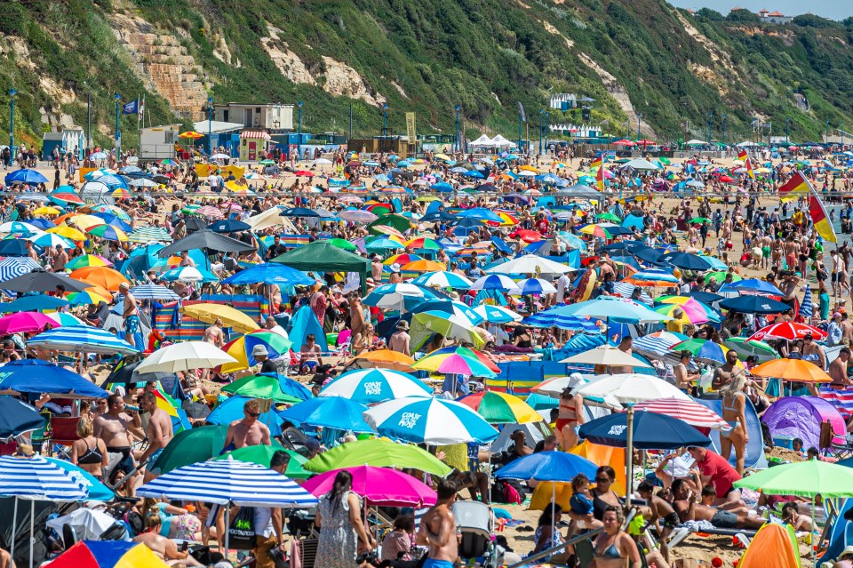 Britain's weltering heatwave risks sparking riots, the Government fears (pictured Bournemouth)