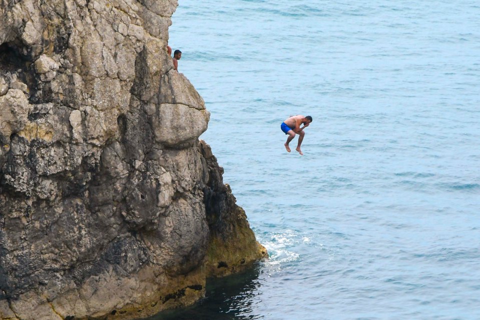 One man was seen plunging into the sea to cool off