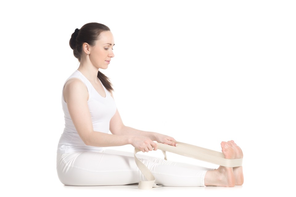 If your hamstrings are tight you can sit on a bolster or block to help your pelvis tilt forward