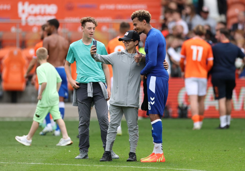 Fans took pictures with Alli after the game