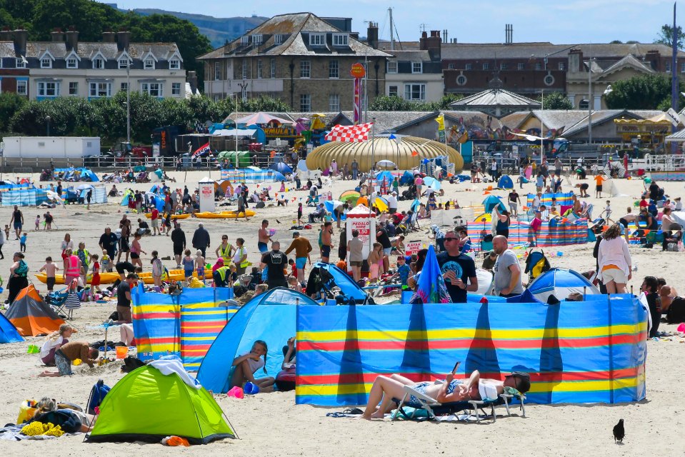 Sun worshippers were out on Weymouth beach in Dorset recently