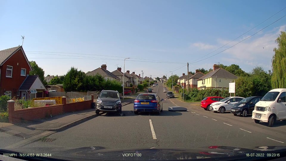 The motorist's unstable roof box flew off into the road after the collision