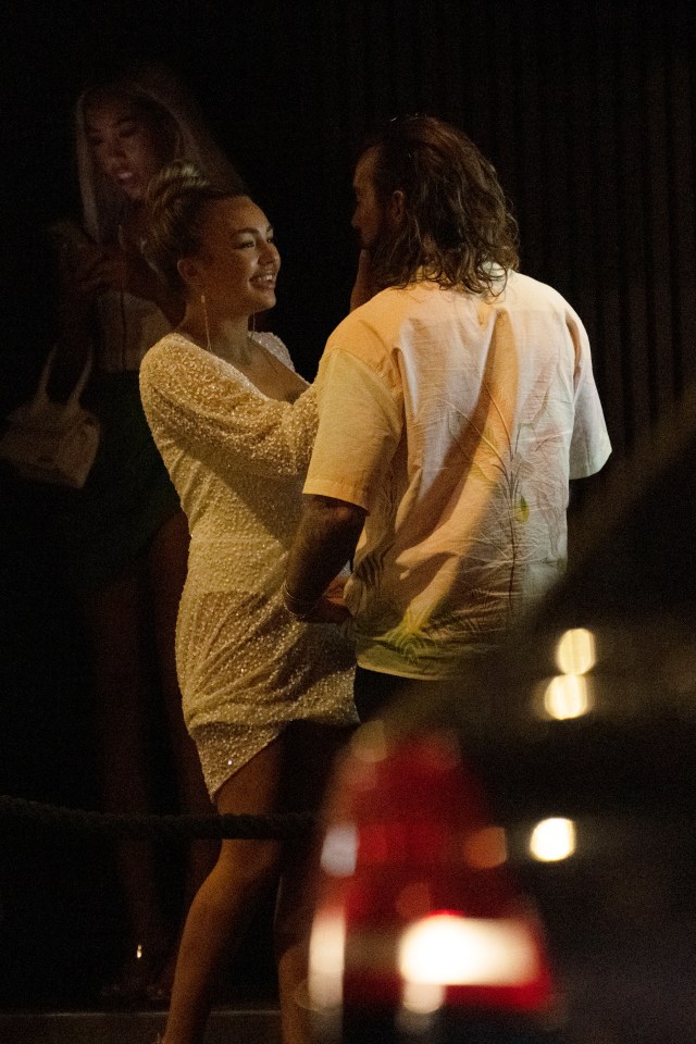 The pair looked cosy after a boozy night out in London