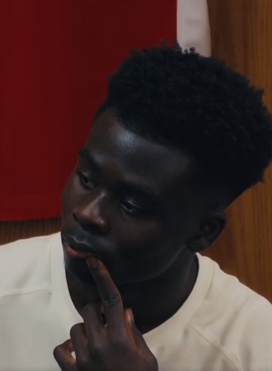 Bukayo Saka listened intently to his manager