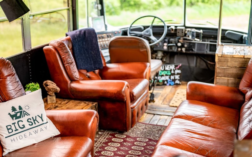 The front of the bus has a lounge area