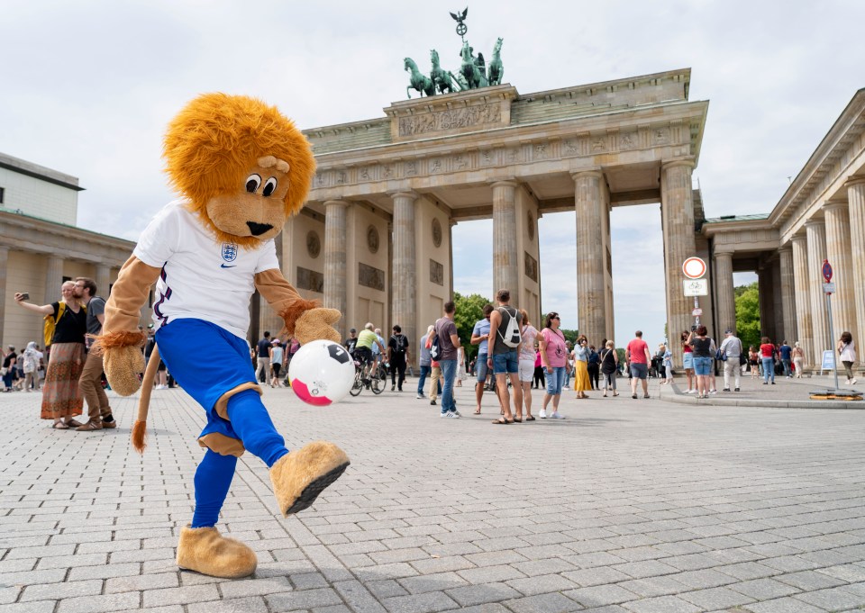 Harry yesterday strode into the city centre to pose at Berlin’s Brandenburg Gate