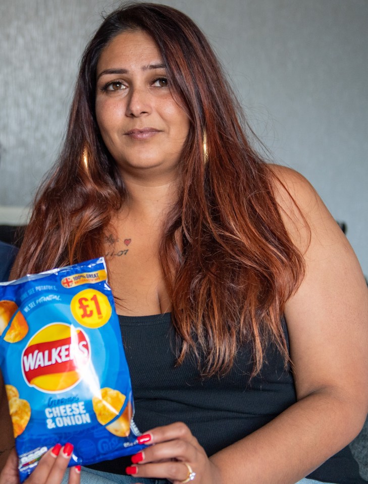 Sabrina -pictured with the offending packet - says she was left vomiting after the gruesome find