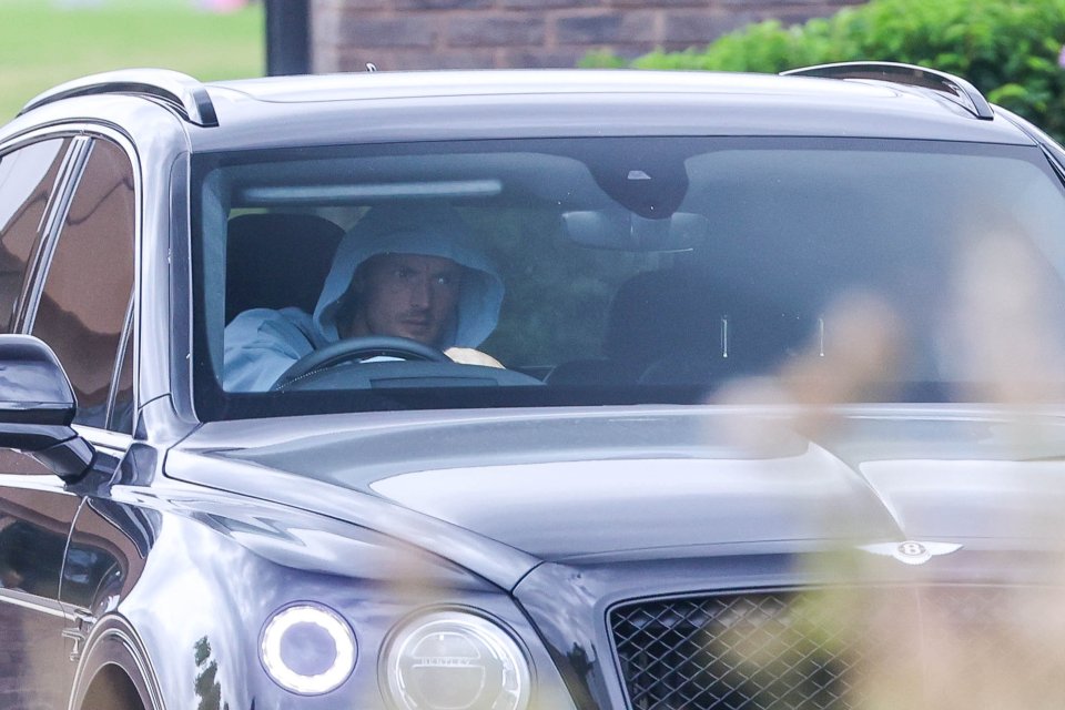 Jamie wore a hood as he left training yesterday