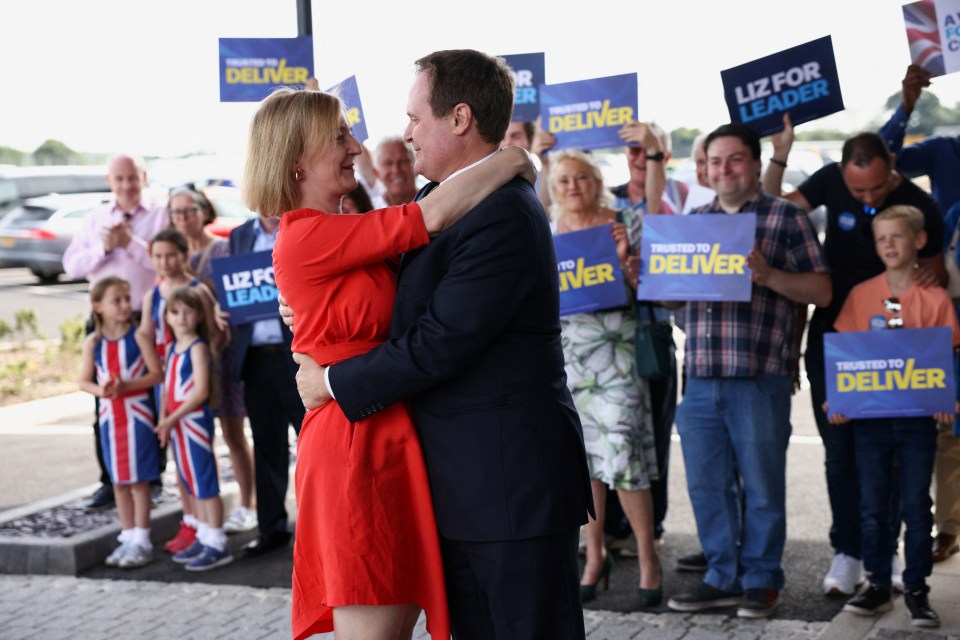 Tom Tugendhat embraced Liz Truss at a Conservative Party leadership campaign event at Biggin Hill Airport, Westerham, London, on Saturday