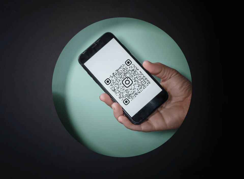 You can scan QR codes with an iPhone or Android