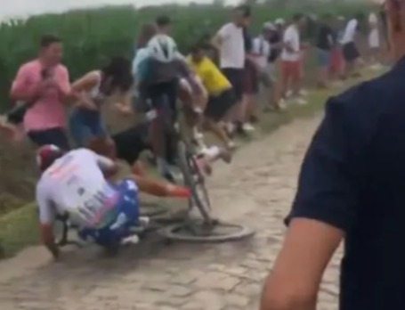 The Italian rider crashed into a fan who strayed too close to the action