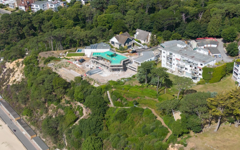 Residents say the newly-built sun room atop of the mansion looks like a 'watchtower in Alcatraz'